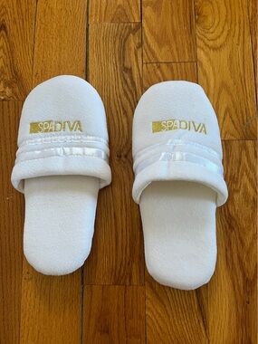 Free with purchase. Women's White Plush Slide Slippers with Gold Accent